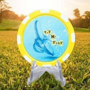 Try me baby, blue banana, yellow and white poker chip style golf ball marker.